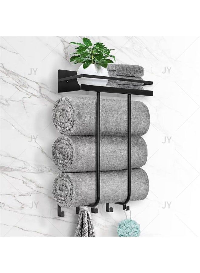 A stylish and practical bathroom towel rack for organizing towels - Image 1